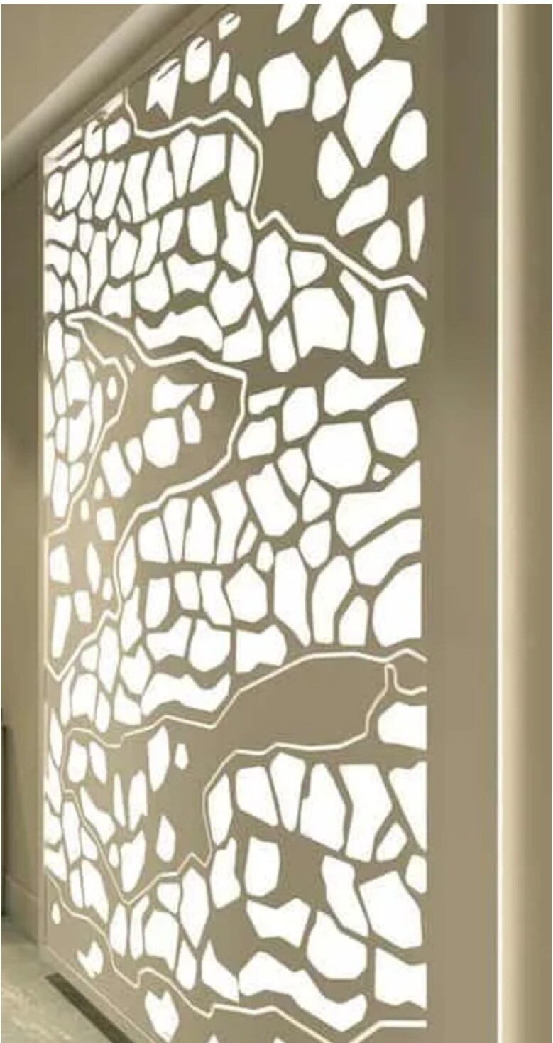 Green wall panel with abstract leaf patterns